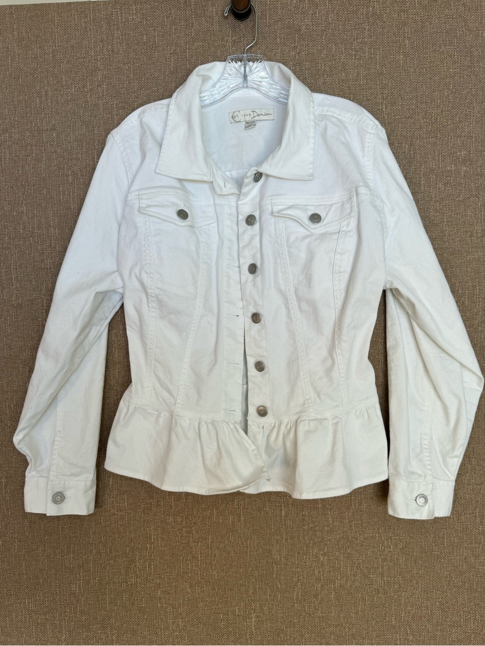 White denim jean jacket with ruffle hem detail